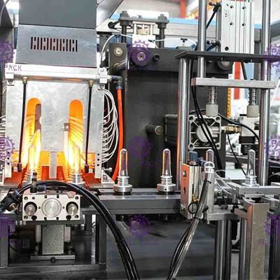 Meyve Suyu İşleme Hattı İçin İki Boşluk 0.1-2L PET Şişe Şişirme Makinesi